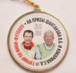 Медаль турнира.