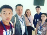  Татьяна, Капорская Анастасия, Гумпылов Юрий, Санжитов Сергей с академиком РАН Говорун В.М. во время конференции